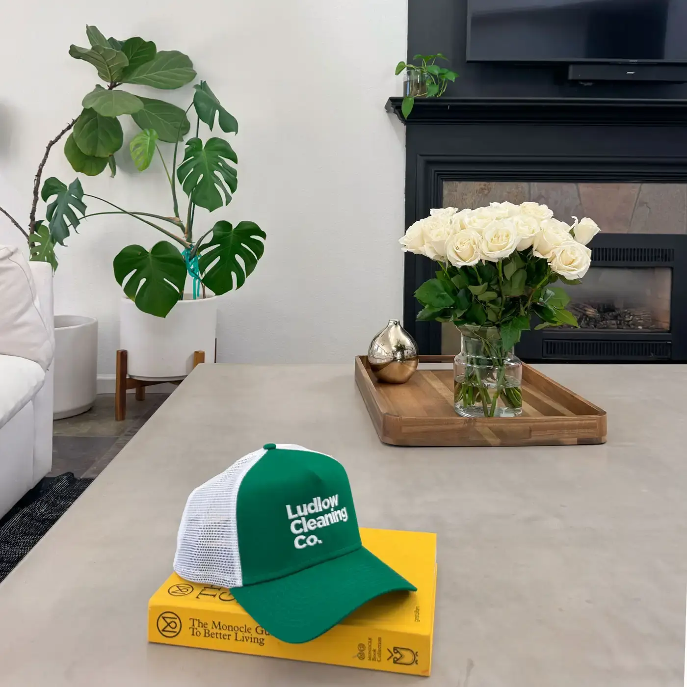 Ludlow Cleaning Co. branded hat on coffee table in freshly cleaned El Dorado Hills home
